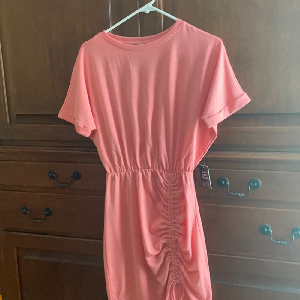 Adorable brand new Salmon colored dress.